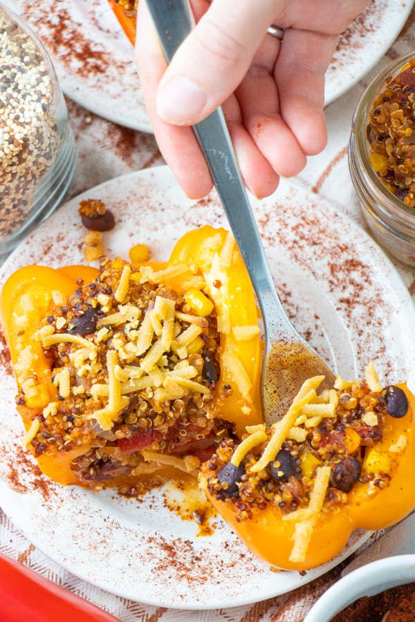 Vegan pepper with quinoa filling on a fork.