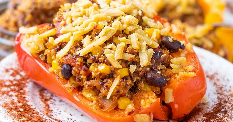 Close up of stuffed red pepper with cheese.