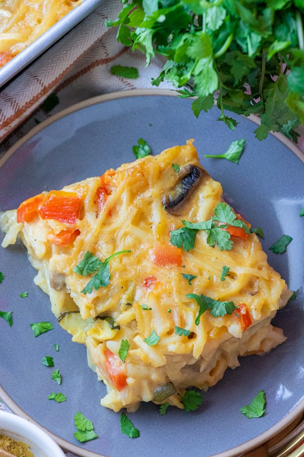 Close up of casserole slice on plate.