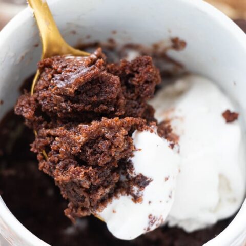 Bite of brownie and ice cream.