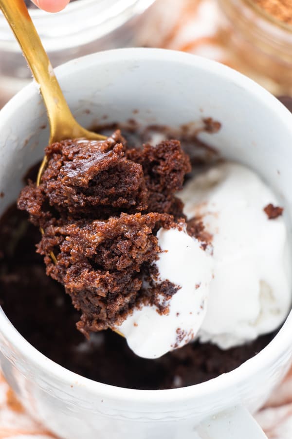 Bite of brownie and ice cream.