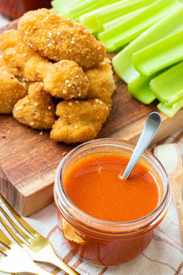 Buffalo sauce in serving cup.