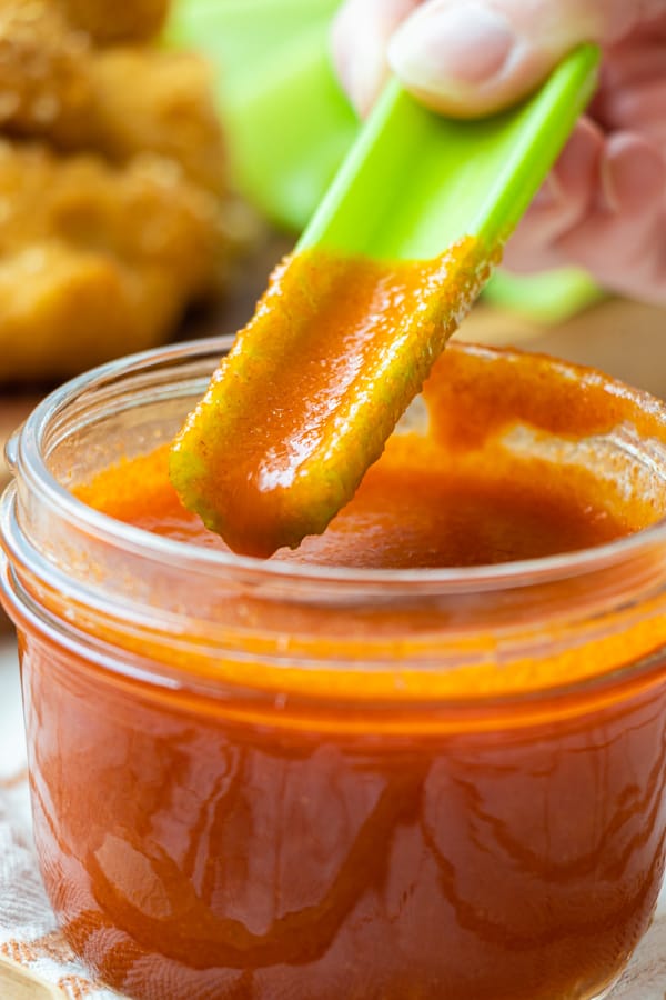 Celery dipped in buffalo sauce.