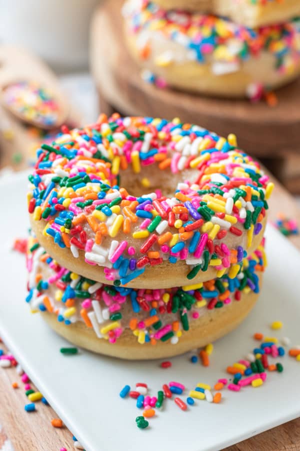 Donuts stacked on white plate