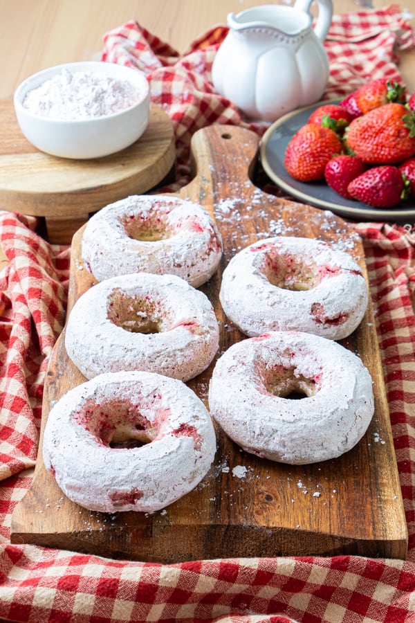Donuts on serving board.