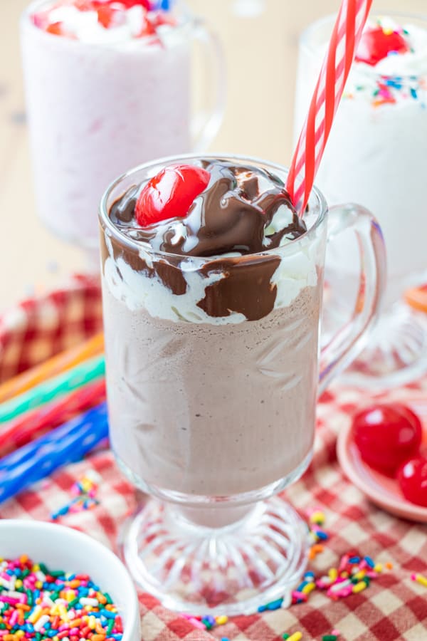 Shake in glass with chocolate sauce.