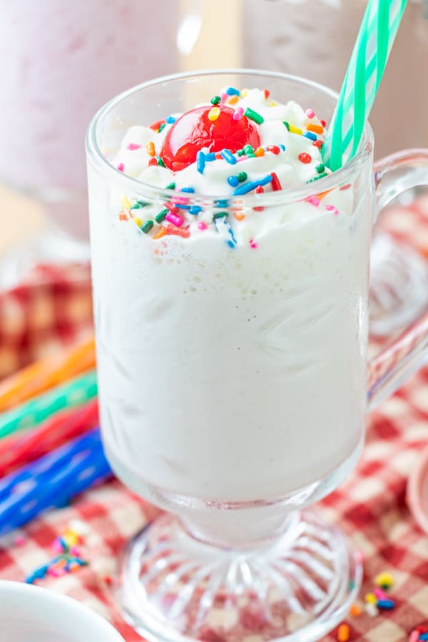 Vanilla milkshake with sprinkles.