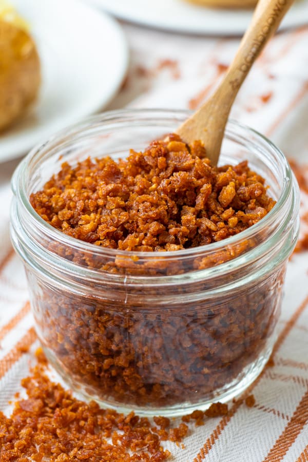Baked bacon bits in glass jar.