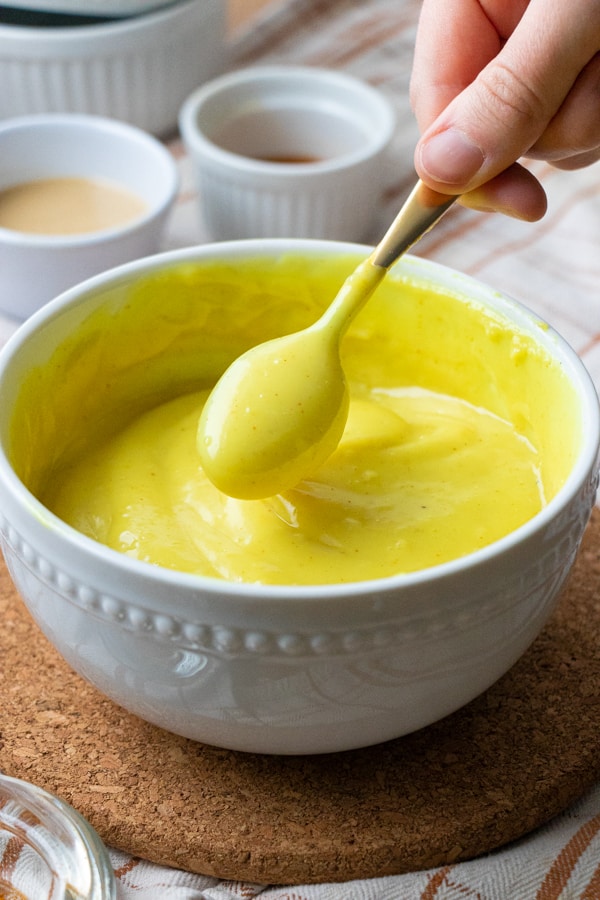 Custard on spoon.