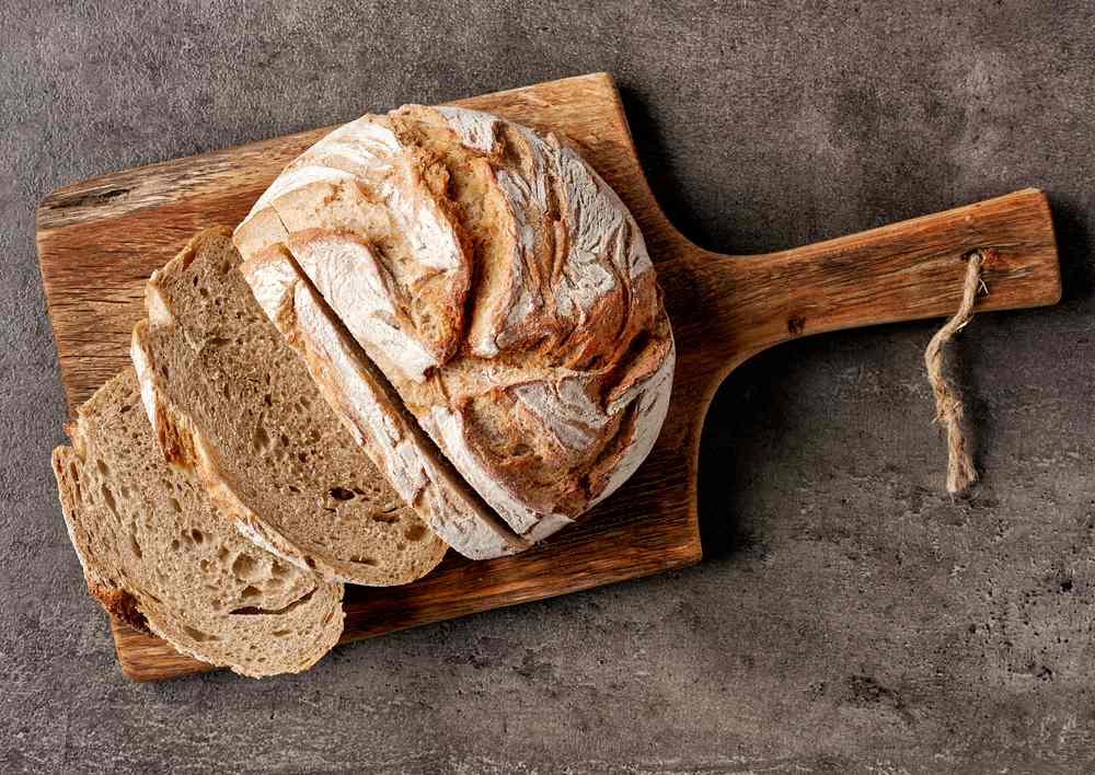 Sourdough Bread sliced on a board